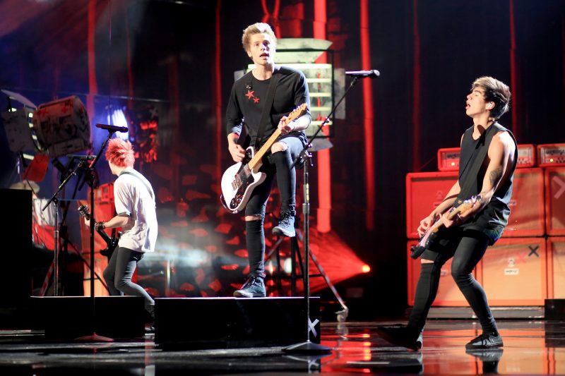 Recording artists 5 Seconds of Summer perform onstage at the 2014 American Music Awards at Nokia Theatre L.A. Live on November 23, 2014 in Los Angeles, California. (Photo by Christopher Polk/AMA2014/Getty Images for DCP)