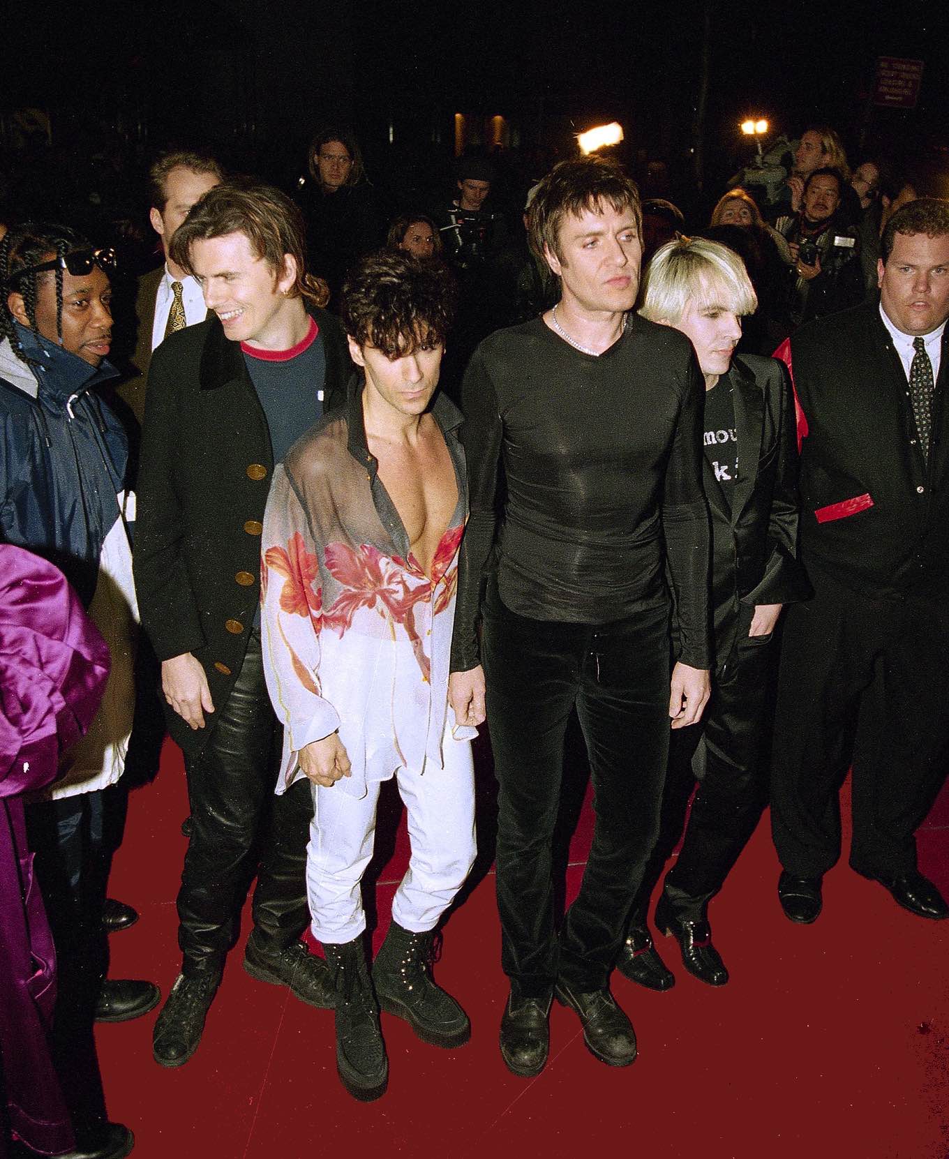 Members of the band Duran Duran arrive for their opening night performance at New York's Fashion Cafe, April 7, 1995. From left: John Taylor, Roger Taylor, Simon Le Bon, and Nick Rhodes. (AP Photo/Adam Nadel)