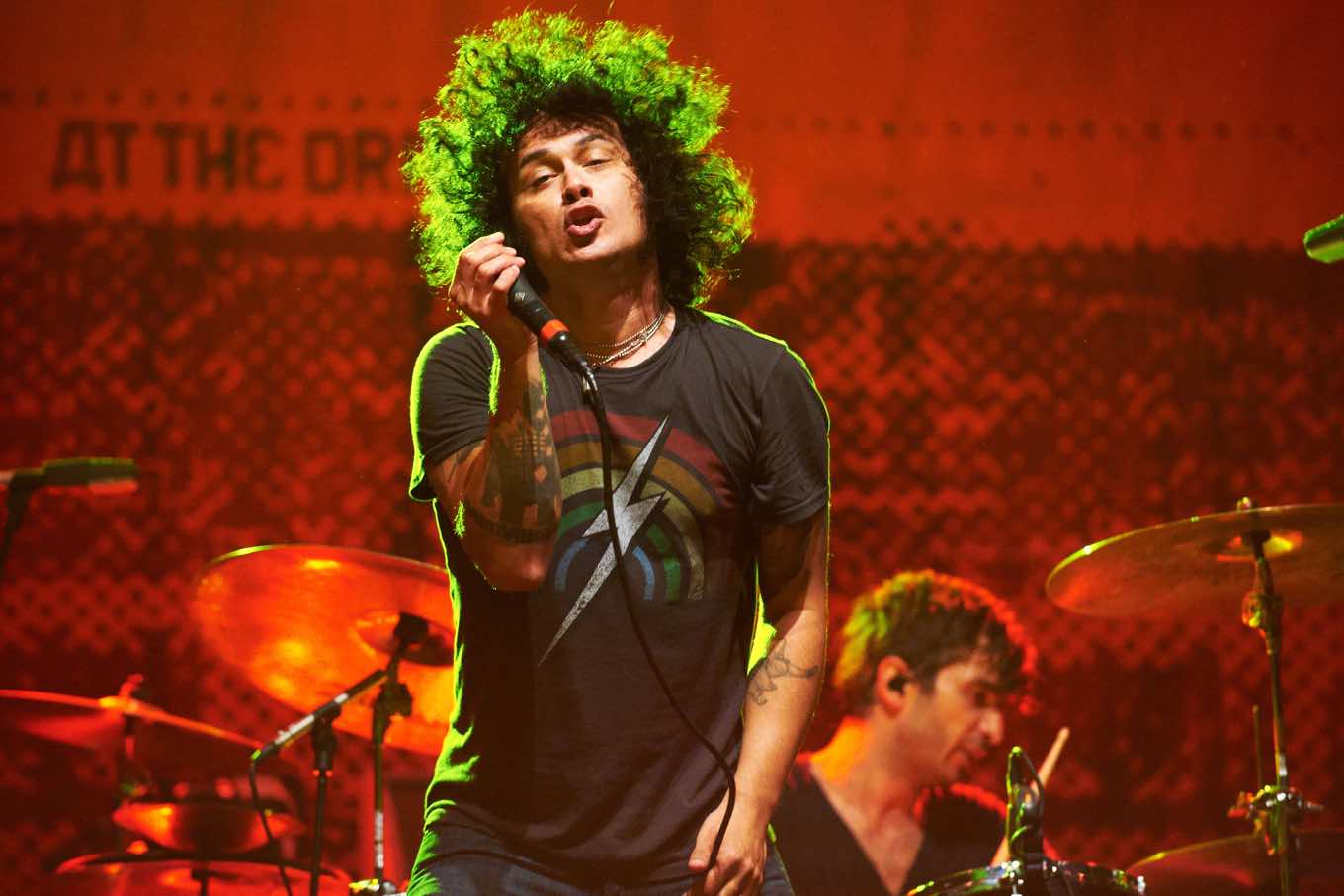 Cedric Bixler-Zavala of At the Drive-In performs on stage during the final day of Leeds Festival at Bramham Park on August 26, 2012 in Leeds, United Kingdom. (Photo by: Gary Wolstenholme/Getty)