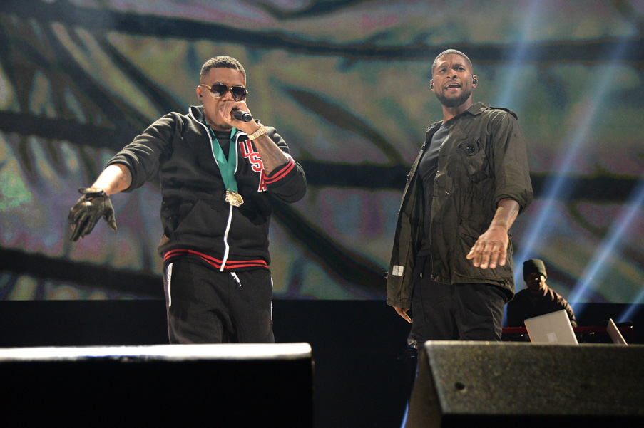 Nas (L) and singer-songwriter Usher perform onstage during TIDAL X: 1020 Amplified by HTC at Barclays Center of Brooklyn on October 20, 2015 in New York City. (Photo by Kevin Mazur/Getty Images for TIDAL)