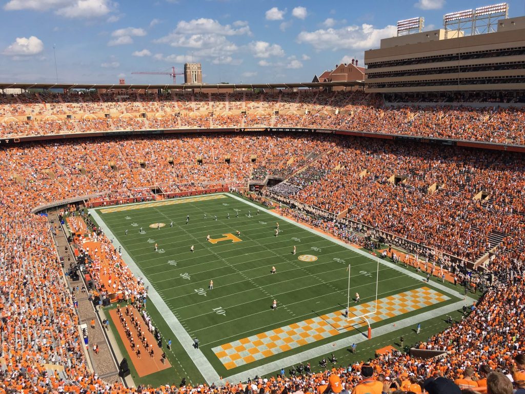 NFL action is seen in a general stadium view from an end zone in